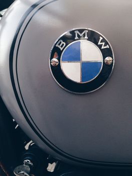 BANGKOK, THAILAND - JULY 23, 2014: The BMW-known logo at a historic BMW-Motorbike (Berlin-Germany). BMW is a German automobile, motorcycle and engine manufacturing company founded in 1916.