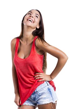 Beautiful young woman laughing, isolated over white background