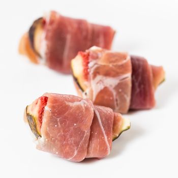 Slices of figs in Prosciutto Italian cured ham