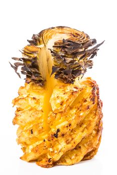 Juicy grilled pineapple on white background. Close-up
