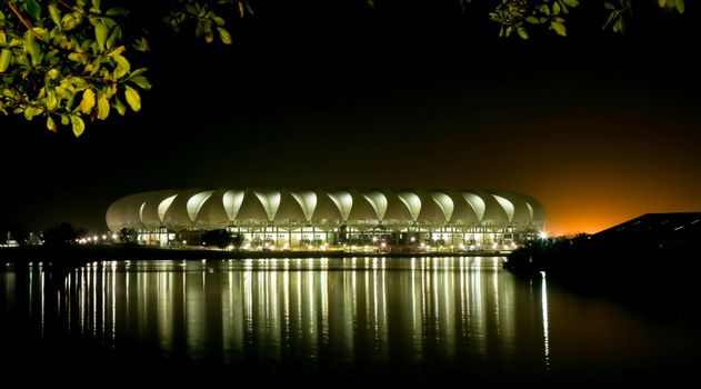 Port Elizabeth Soccer Stadium at Night with lights reflecting on the water