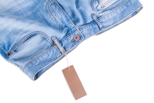 Blue jeans detail with blank label - Stock Images