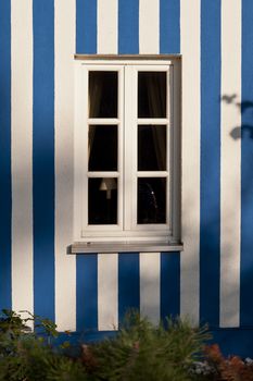 White and Blue Facade with a Window