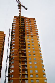 High rise construction. Brick houses under construction