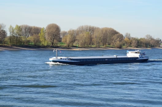 A river barge on the Rhine. 
Barges are designed for navigation on inland waterways and inland waterways.