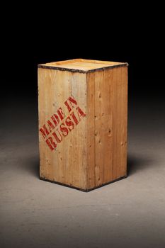 Conceptual image of a wooden crate with text "Made in Russia"