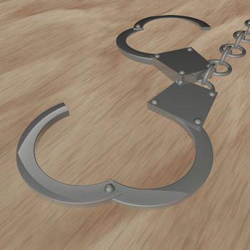 Handcuffs over wooden background, 3d render