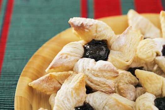 Finnish star-shaped joulutorttu christmas puff pastrieswith dried plum marmalade 