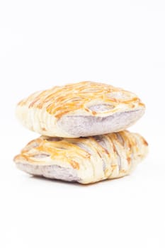 bread on white isolated background.Bread baked with a sweet fruit filling inside.