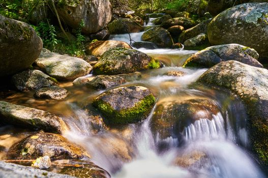 Madriu river flowing among stones. Andorra