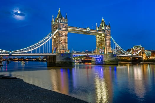 Tower Bridge and Thames River Lit by Moonlight at the Evening, London, United Kingdom
