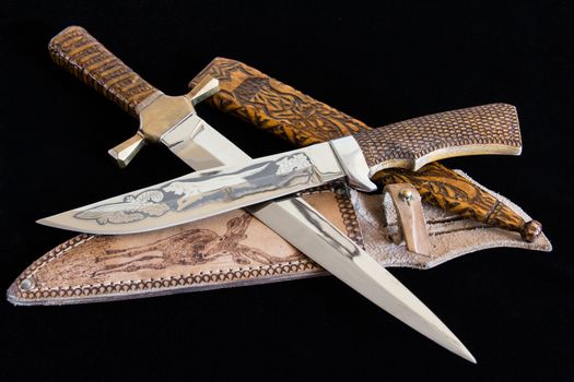 Photo of cold weapon on black background