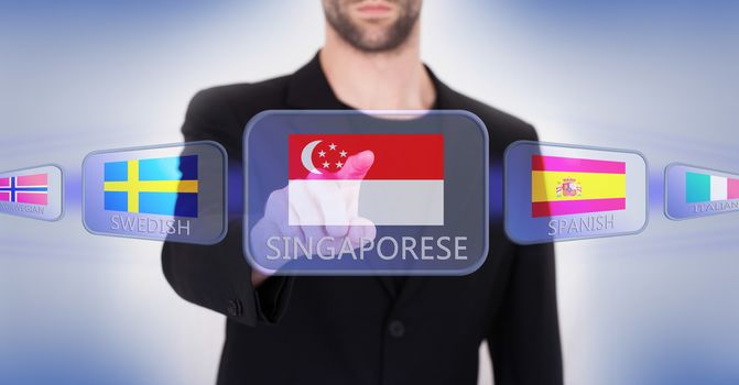 Hand pushing on a touch screen interface, choosing language or country, Singapore