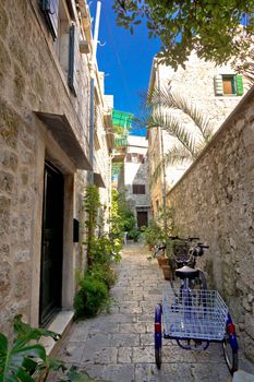 Narrow mediterranean stone street in Stari Grad, Island of Hvar, Croatia