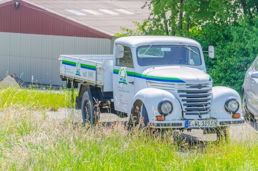 Essen, Nrw, Germany - June 13, 2014: In Essen way towards Mülheim Airport. Old truck parked on the street, to advertising. Oldtimer constructed from the year 1954 to 1961 in the former GDR in the VEB Barkas works Karl Marx Stadt. 
This three-quarter-ton truck is the smallest of the former GDR have been.