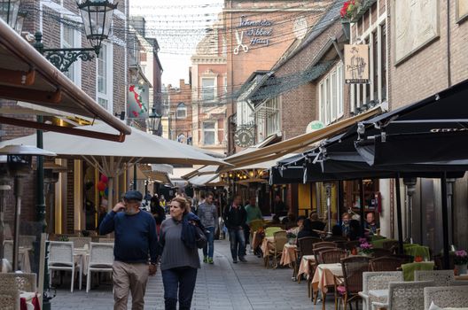 Dusseldorf Altstadt, Nrw, Germany - September 21, 2014: View of the famous Schneider Wibbel alley in the old town of Düsseldorf. In this small street there are many restaurants. In addition, the alley is one of one of the most beautiful small streets in the old town.