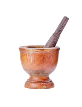 Wooden mortar and pestle on isolated white background