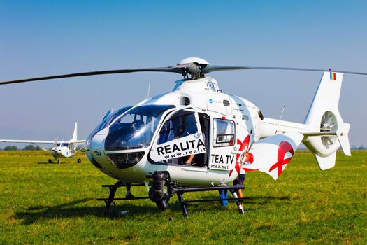 Brasov, Romania - August 12, 2010: TV news helicopter on a blue sky