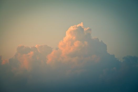 Cumulus clouds at dawn. Toned image