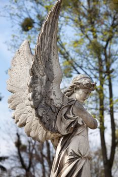 Old statue on grave in the Lychakivskyj cemetery of Lviv, Ukraine.