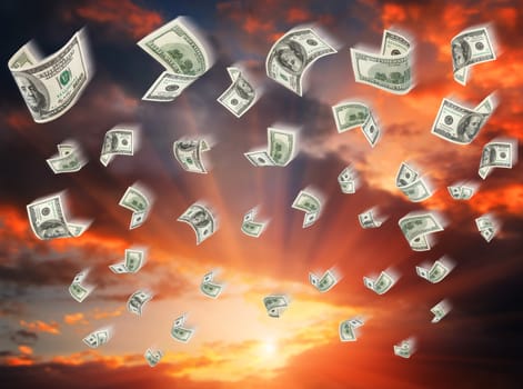 Cash, paper dollars, falling against sunset. Finance concept