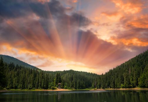 Sunset on Sinevir lake. Volcanic lake in the Carpathian Mountains. Ukraine, Europe