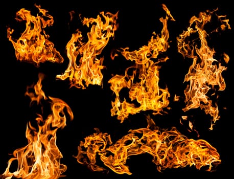 Orange fire flames on a black background set