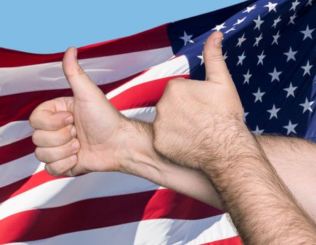Patriotic concept. Thumbs up sign against of United States of America flag