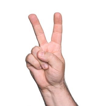 Man hand showing the sign of victory and peace isolated on white background

