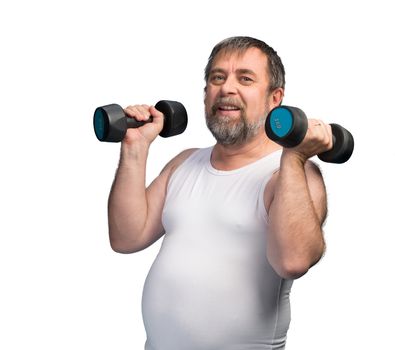 Middle-aged man with a paunch exercising with dumbbells isolated on white background