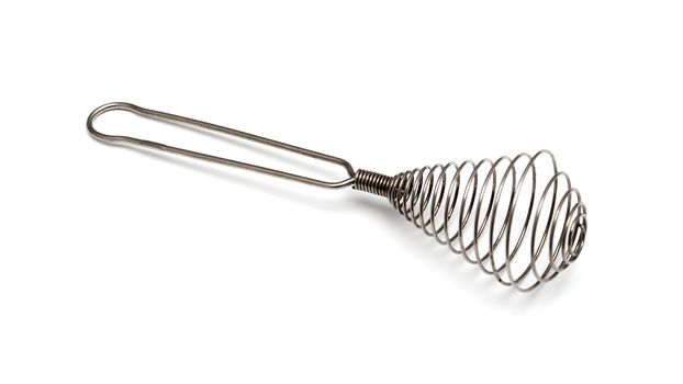 Stainless steel whisk isolated on white background