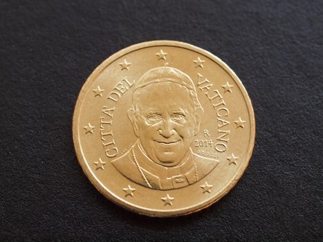 Fifty Euro cent coin from Vatican City bearing the portrait of Pope Bergoglio Francis I isolated over black background