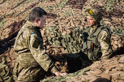 DONETSK REGION, UKRAINE - Oct 10, 2014: President of Ukraine Petro Poroshenko inspected the fortifications in the Donetsk region