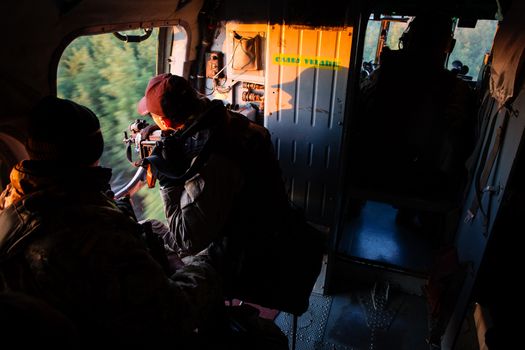 DONETSK REGION, UKRAINE - Oct 10, 2014: Ukrainian army helicopter patrols the area of of the antiterrorist operation in the Donetsk region