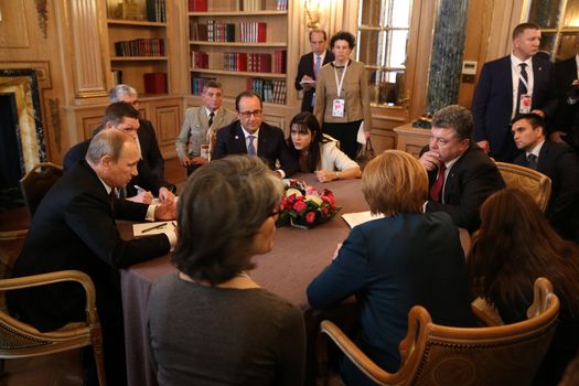 MILAN, ITALY - Oct 17, 2014: President Ukraine Poroshenko, German Chancellor Merkel, French President Hollande and Russian President Putin during a meeting on ASEM summit of European and Asian leaders