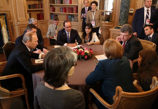 MILAN, ITALY - Oct 17, 2014: President Ukraine Poroshenko, German Chancellor Merkel, French President Hollande and Russian President Putin during a meeting on ASEM summit of European and Asian leaders