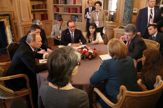 MILAN, ITALY - Oct 17, 2014: President Ukraine Poroshenko, German Chancellor Merkel, French President Hollande and Russian President Putin during a meeting on ASEM summit of European and Asian leaders