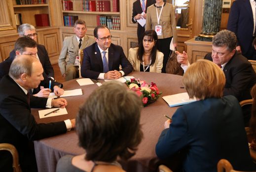 MILAN, ITALY - Oct 17, 2014: President Ukraine Poroshenko, German Chancellor Merkel, French President Hollande and Russian President Putin during a meeting on ASEM summit of European and Asian leaders