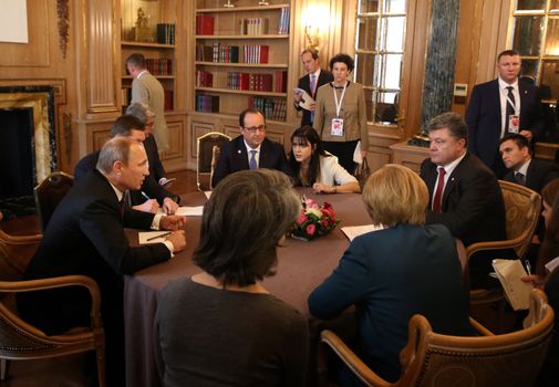 MILAN, ITALY - Oct 17, 2014: President Ukraine Poroshenko, German Chancellor Merkel, French President Hollande and Russian President Putin during a meeting on ASEM summit of European and Asian leaders