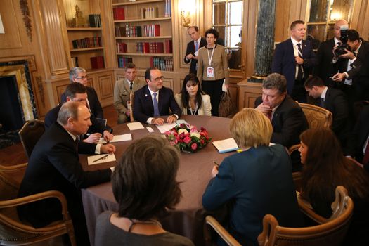 MILAN, ITALY - Oct 17, 2014: President Ukraine Poroshenko, German Chancellor Merkel, French President Hollande and Russian President Putin during a meeting on ASEM summit of European and Asian leaders