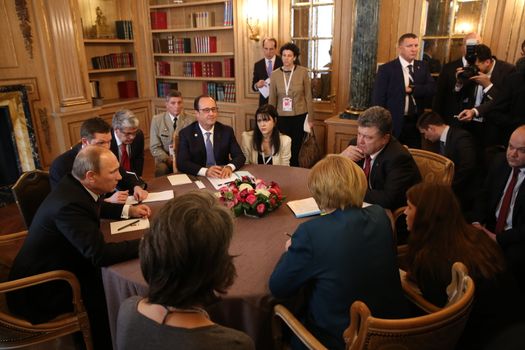 MILAN, ITALY - Oct 17, 2014: President Ukraine Poroshenko, German Chancellor Merkel, French President Hollande and Russian President Putin during a meeting on ASEM summit of European and Asian leaders