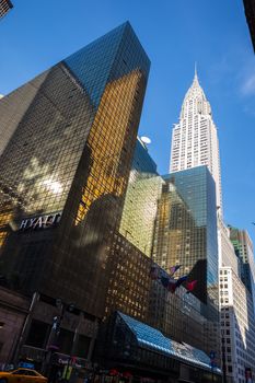 NEW YORK, USA - Jun 01, 2014: Chrysler building and manhattan modern architecture. Manhattan is the most densely populated of the five boroughs of New York City