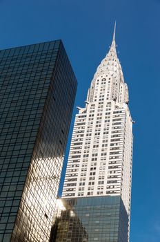 NEW YORK, USA - Jun 01, 2014: Chrysler building and manhattan modern architecture. Manhattan is the most densely populated of the five boroughs of New York City