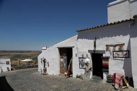 The Medieval Fortress of Monsaraz with the typical white narrow streets
