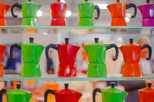View of many colorful Moka, Italian coffee maker