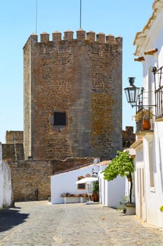 The Medieval Fortress of Monsaraz with the typical white narrow streets
