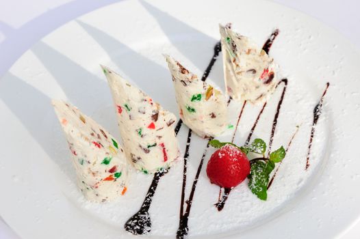 Italian dessert semifreddo with succades and strawberry