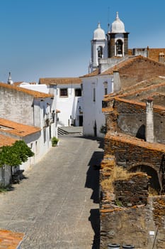 The Medieval Fortress of Monsaraz with the typical white narrow streets
