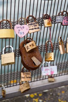 The locks at the fence of Pont des Arts in Paris