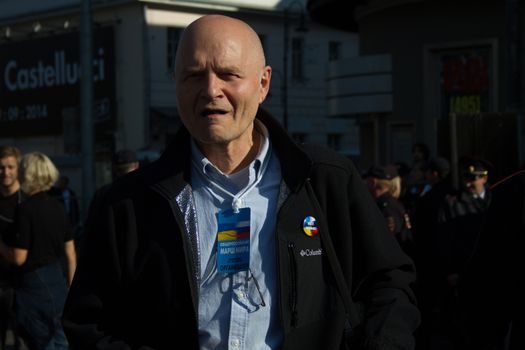 Moscow, Russia - September 21, 2014. Co-organizer of the March of peace Michael Schneider Peace March in Moscow against war with Ukraine